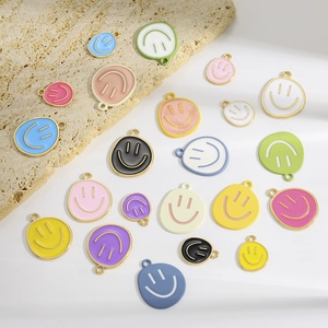 Colorful enamel smiley face charms for DIY jewelry making in various candy colors