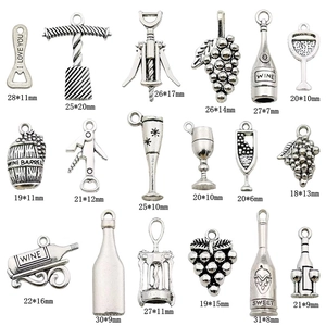 Set of 17 vintage silver alloy wine themed charms including bottle opener and grape designs