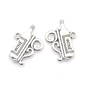 Pair of vintage silver alloy wine bottle charms with WINE engraving for DIY jewelry