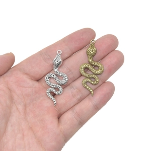 Vintage 3D slangenhanger set in zilver en brons met gedetailleerde schubbenstructuur