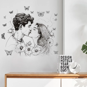Romantic black hand-drawn couple kissing wall sticker with floral and butterfly accents