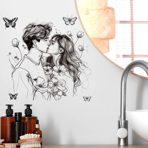 Minimalist black and white wall sticker showing a romantic couple kissing with butterflies