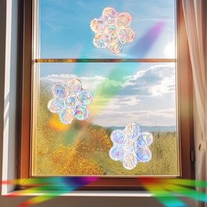 Holographic flower window sun catcher stickers reflecting colorful rainbows in sunlight