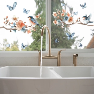 Detail of floral and bird static window film on glass with soft watercolor aesthetics