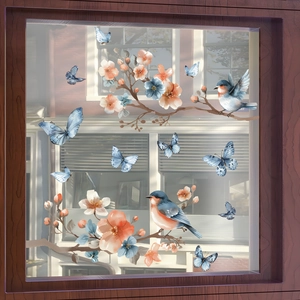 Detailed static window decal featuring vibrant blue birds and blooming floral branches