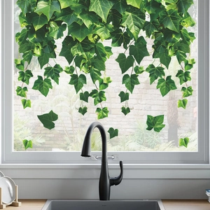 Fresh green ivy vine window stickers for home decor in a bright modern kitchen setting