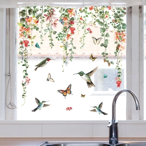 Floral vines with hummingbirds and butterflies static cling stickers on kitchen window