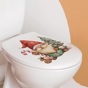 Detail of Christmas gnome and pine tree decal on a toilet lid for festive bathroom decor