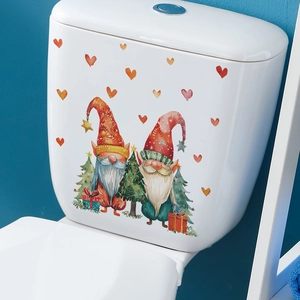 Cartoon Christmas gnomes with hearts watercolor sticker applied on white toilet tank