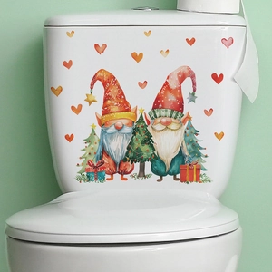 Christmas gnome and heart pattern stickers on a white toilet tank for bathroom decor