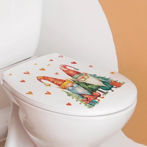 Detail view of festive Christmas gnomes with hearts on a waterproof toilet lid sticker