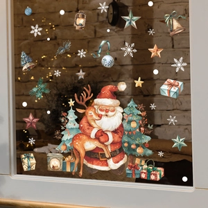 Christmas window stickers featuring Santa, reindeer and snowflakes for festive home decoration