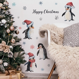 Christmas wall decals set with cute penguins and snowflakes for holiday home decoration