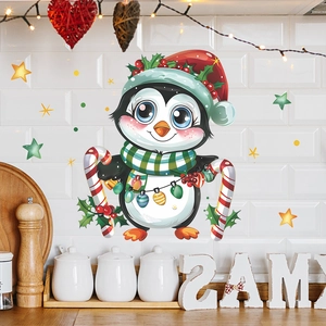 Christmas window sticker featuring a cute cartoon penguin with a red hat and candy cane
