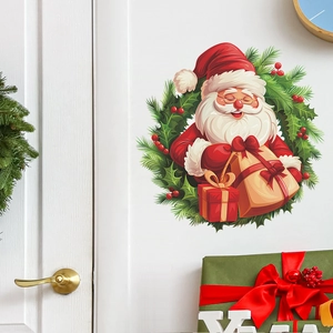 Detail of Christmas Santa Claus wall sticker with festive wreath and gift boxes