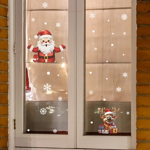 Christmas window decals with Santa Claus, reindeer and snowflakes for festive glass decoration