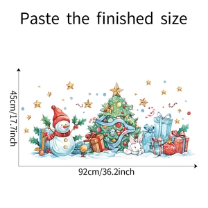Finished size dimensions for Christmas snowman and tree wall sticker on a white background