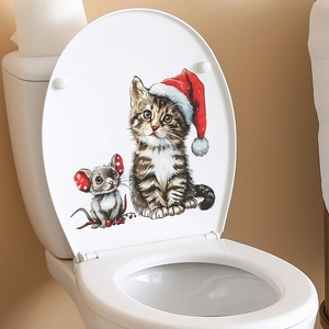 Christmas cat and mouse wall sticker on a white ceramic toilet lid for holiday home decor