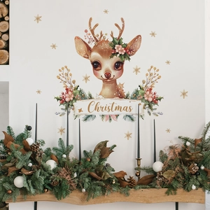 Christmas reindeer wall decal with green wreath and golden snowflakes on white wall