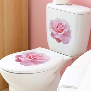 Pink rose floral wall stickers applied to white ceramic toilet tank for home decoration