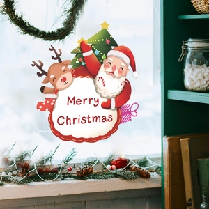 Detail of Christmas window stickers with Santa, reindeer and Merry Christmas text