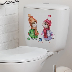 Cartoon winter mice wall decal with scarf and hat on a white bathroom toilet tank