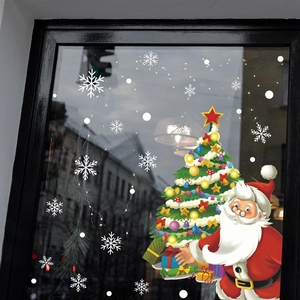 Christmas window decals with Santa Claus, Xmas tree and snowflakes on glass