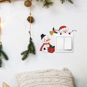 Christmas snowman wall sticker on white light switch with festive holiday home decor