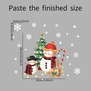 Detailed sheet of Christmas window stickers showing snowman, tree and snowflakes size specs
