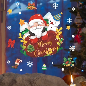 Detail view of Santa and Snowman window stickers creating a festive Christmas scene