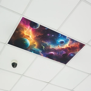 Cosmic ceiling stickers with planets and nebulae installed in a white grid frame