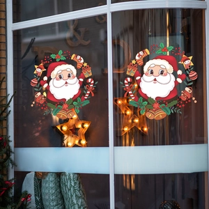 Detailed Christmas Santa bell wreath window sticker with festive warm star lights decoration