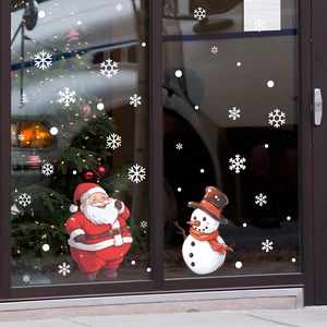 Christmas window decals set featuring Santa Claus, snowman and white snowflakes for glass decor