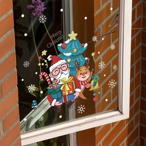 Stickers de Noël pour fenêtres avec Père Noël, renne et flocons de neige sur verre