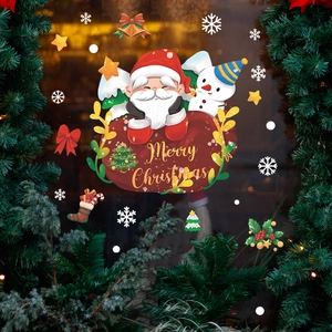 Christmas window decals with Santa Claus snowman and snowflake festive glass decorations