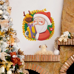 Christmas wall decal with Santa and reindeer on white wall near decorated tree