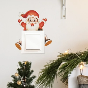 Cute Christmas gnome wall sticker surrounding a light switch with festive holiday decor