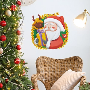 Cartoon Santa and reindeer wall decals in a warm Christmas living room setting