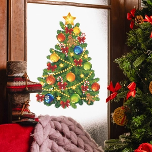 Gros plan du sticker de Noël pour fenêtre avec bonhomme de pain d'épices et canne