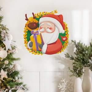 Detail of Christmas wall sticker with Santa, reindeer and gift box in floral wreath