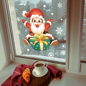 Cartoon Santa Claus on gift box window stickers with white snowflakes for Christmas decor