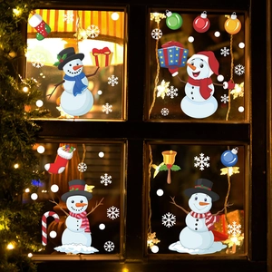 Cozy window display of Christmas snowman wall stickers with festive snowflakes and balls