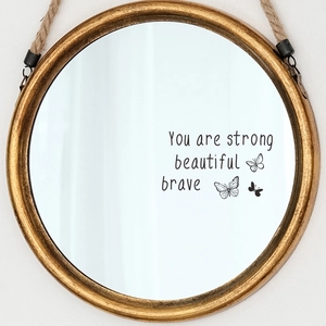 Golden round decorative mirror with butterflies and You Are Strong Brave text design