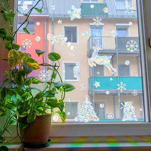 Adesivi natalizi laser arcobaleno con stelle e renne per la decorazione delle finestre