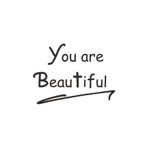 Minimalist 'You are Beautiful' wall sticker with elegant black handwritten font for home decor