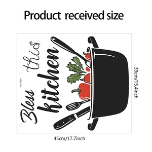 Kitchen wall decal featuring 'Bless this kitchen' quote with utensils and vegetables