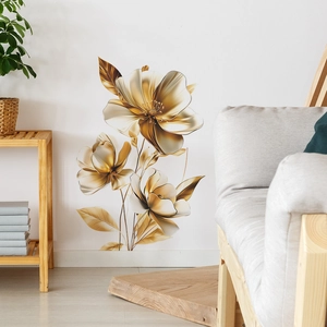 Detail of 3D golden embossed floral wall stickers in a cozy minimalist living room setup