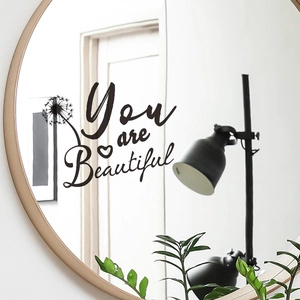 Sticker mural inspirant You are Beautiful avec pissenlit sur un miroir rond en bois