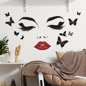 Modern wall sticker featuring red lips eyelashes and black butterflies on white wall