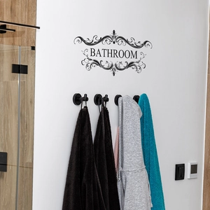 Set of 3 matte black bathroom robe hooks mounted on wall for towels and clothes